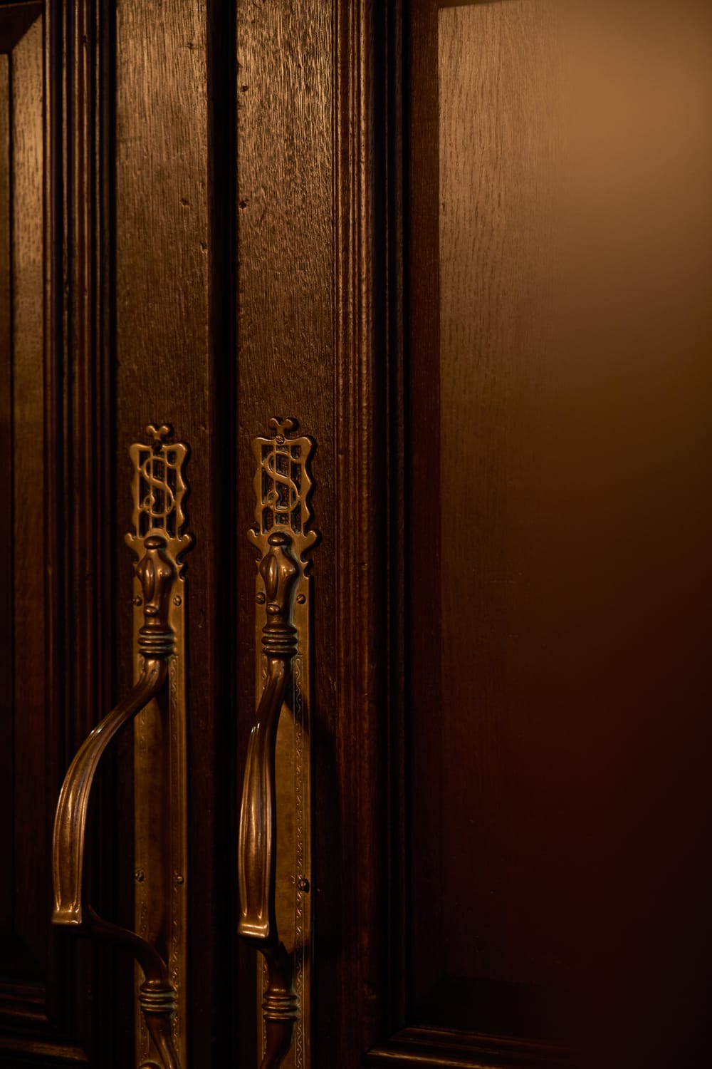Bespoke brass door handles at Grand Divan London