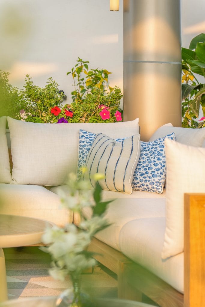 Outdoor lounge seating on the terrace at Eleven Club Doha