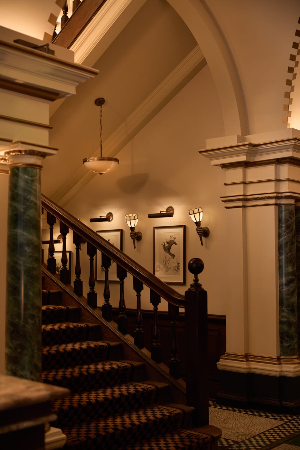 Grand staircase with bespoke carpet runner at Grand Divan London
