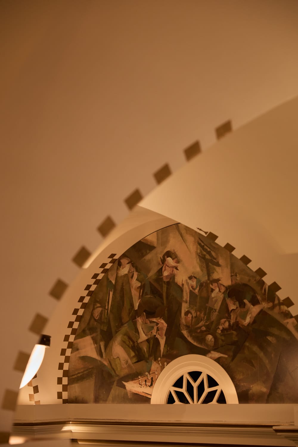 Decorative mural and architectural archway at Grand Divan London
