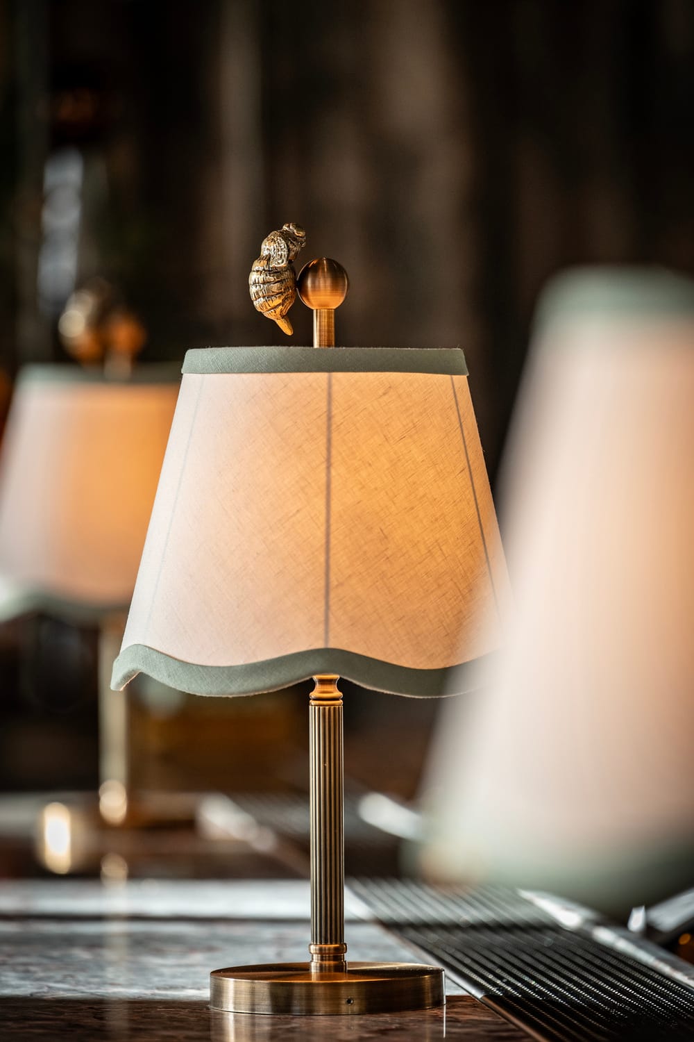 Decorative table lamp with bespoke bee detail at Willet's Cadogan restaurant