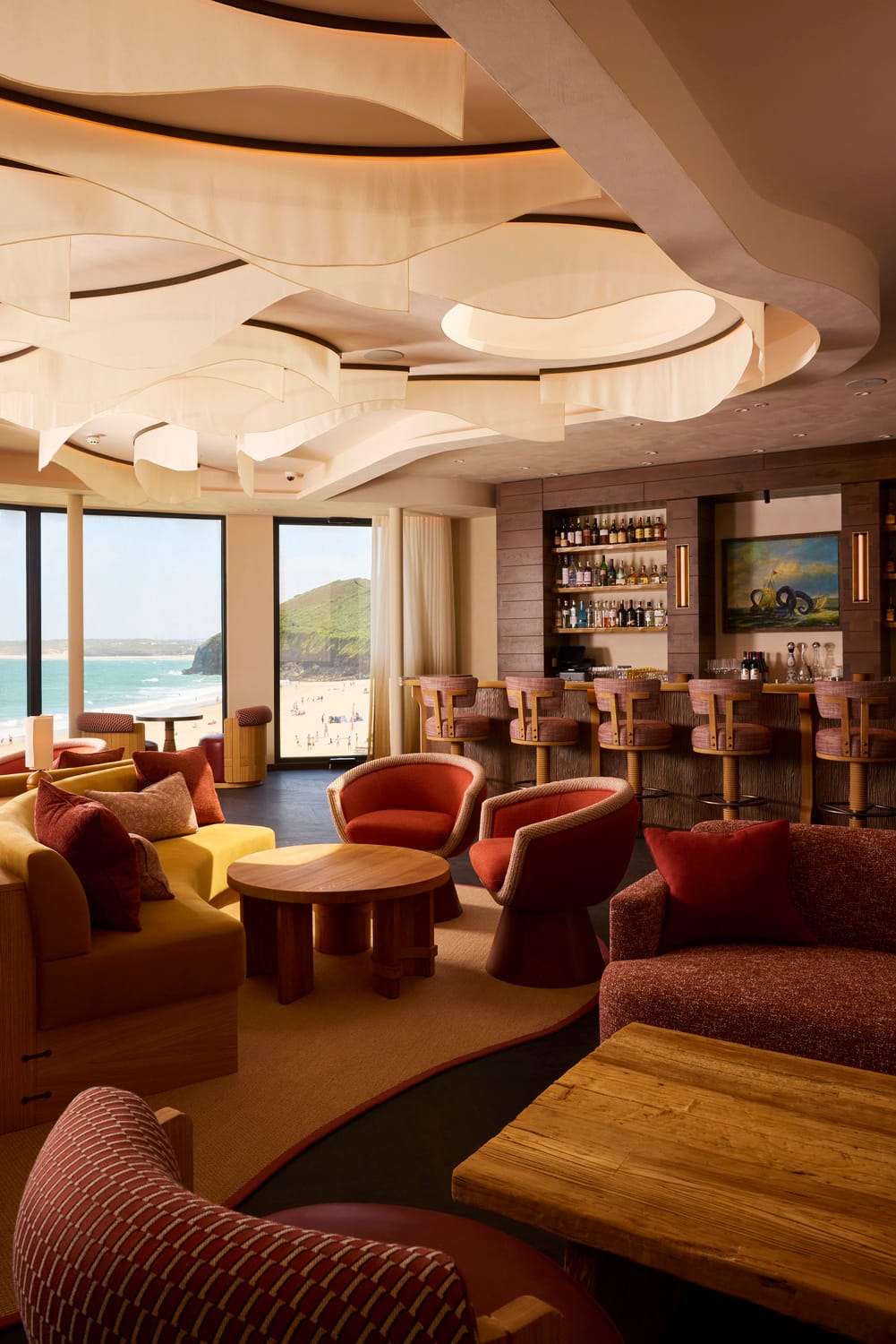 Bar and lounge overlooking the beach at MOR Carbis Bay