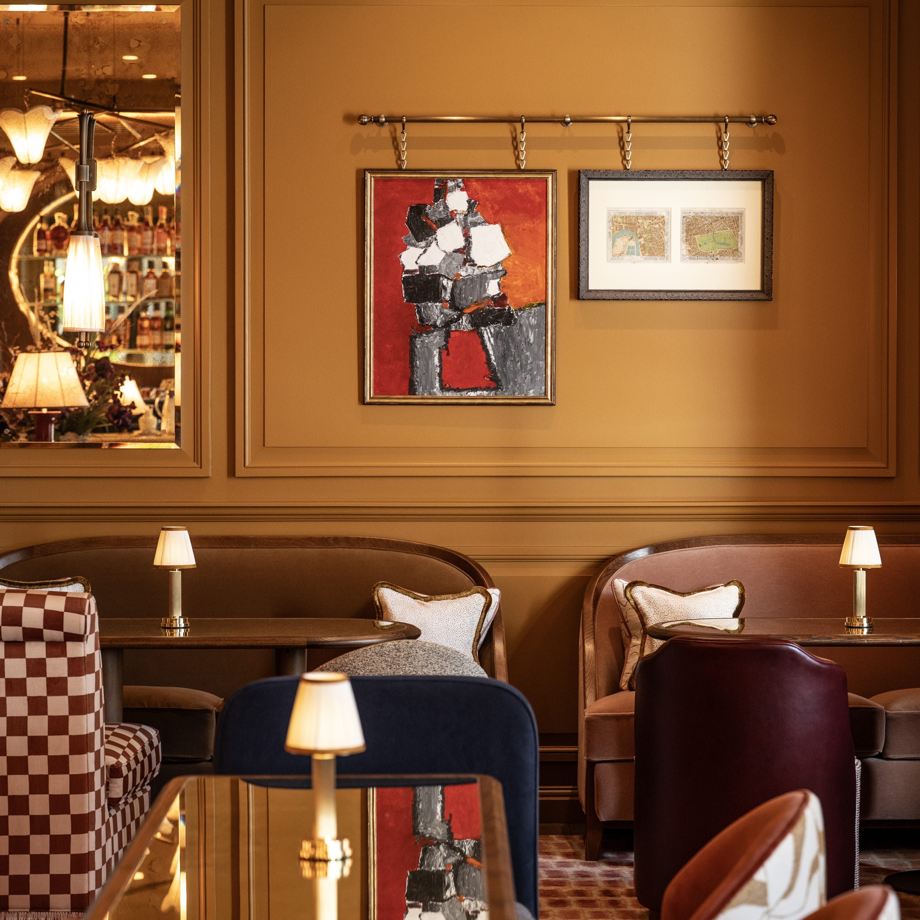 Elegant lounge seating in The Drawing Room Cadogan with curated artwork and bespoke furnishings